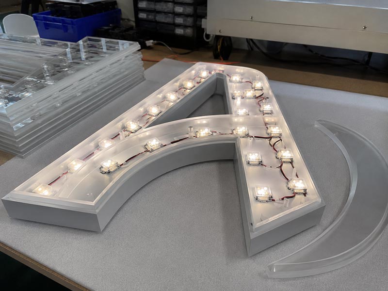LED module layout behind an acrylic LED logo sign