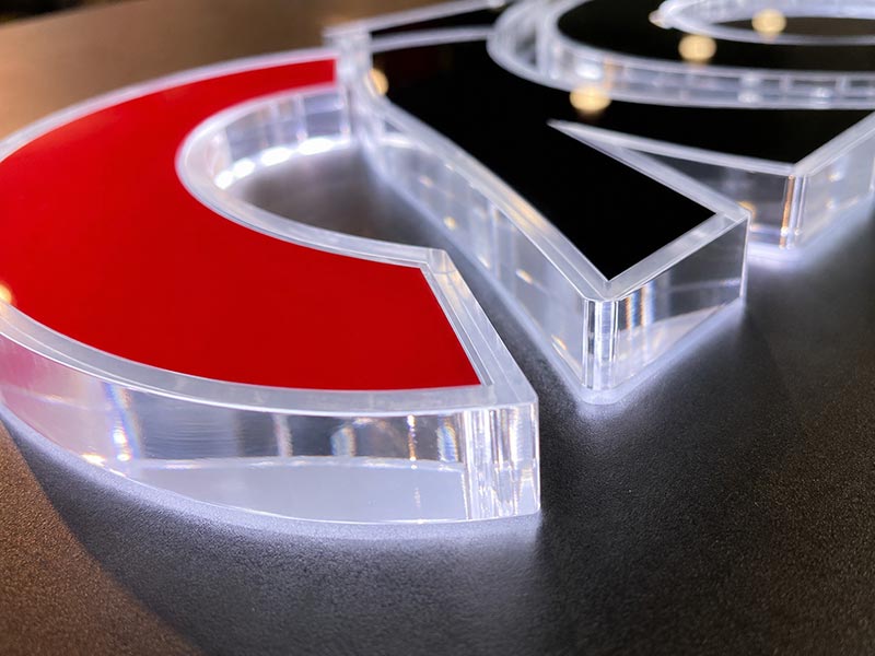 Polished acrylic edge detail for acrylic LED logo sign