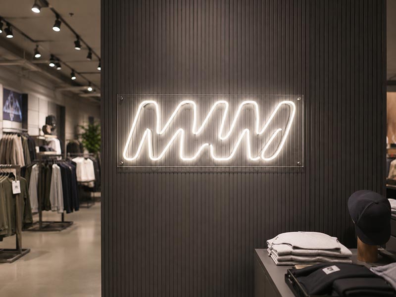 Custom LED neon text sign for chain store brand wall