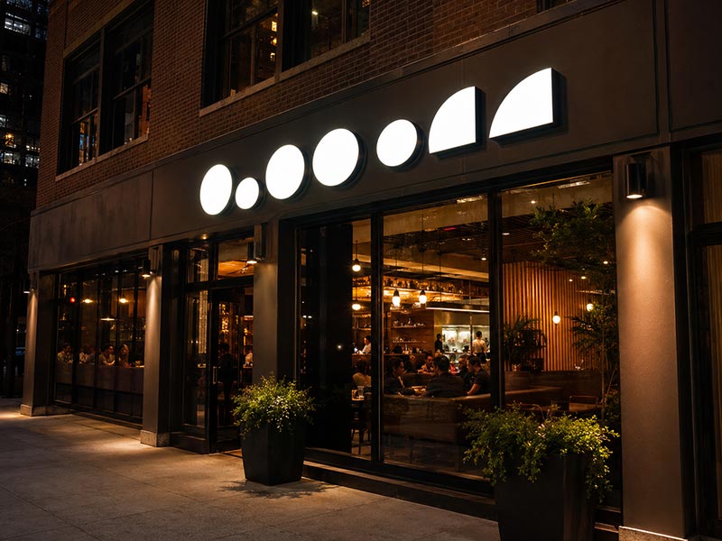 Front-lit channel letters for restaurant storefront visibility at night