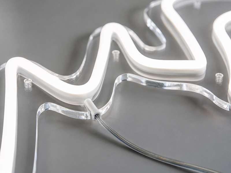 High quality LED neon sign detail showing smooth tubing even brightness and clean acrylic backing