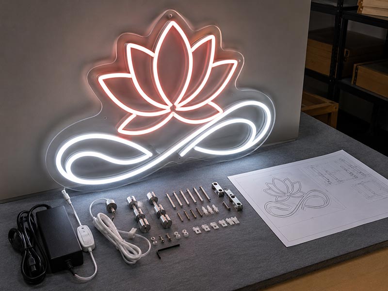 Custom LED neon sign prepared with mounting accessories for a sign company project