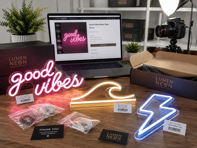 E-commerce seller preparing custom LED neon sign products for online sales
