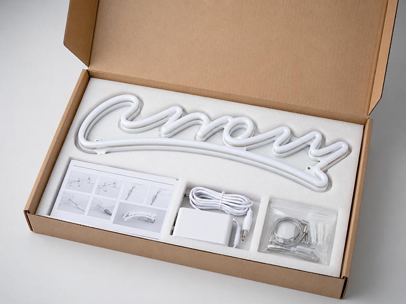 Custom LED neon sign packed in protective foam with installation guide, power adapter, cable, screws, and mounting accessories