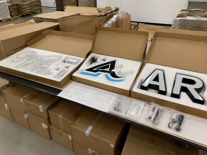 Export packaging for custom LED signs with foam protection accessories and installation notes