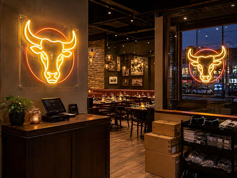 Custom LED neon logo signs exported for a US restaurant brand rollout with repeat-order support