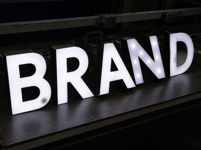 Channel letters showing dark spots, weak corners, dim strokes and uneven face illumination