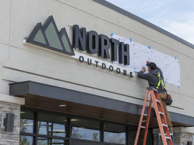 Channel letter mounting system selected for a commercial storefront wall