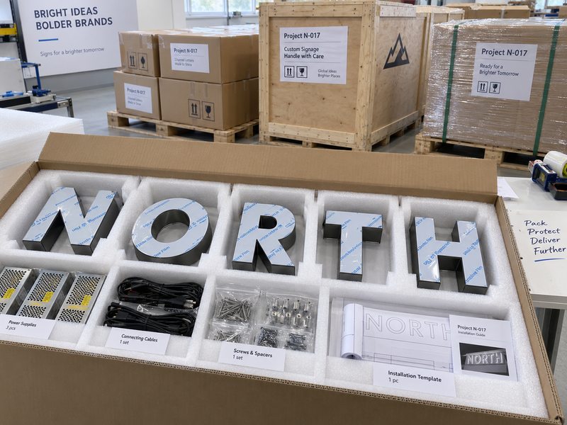 Custom channel letters protected and packed for international delivery