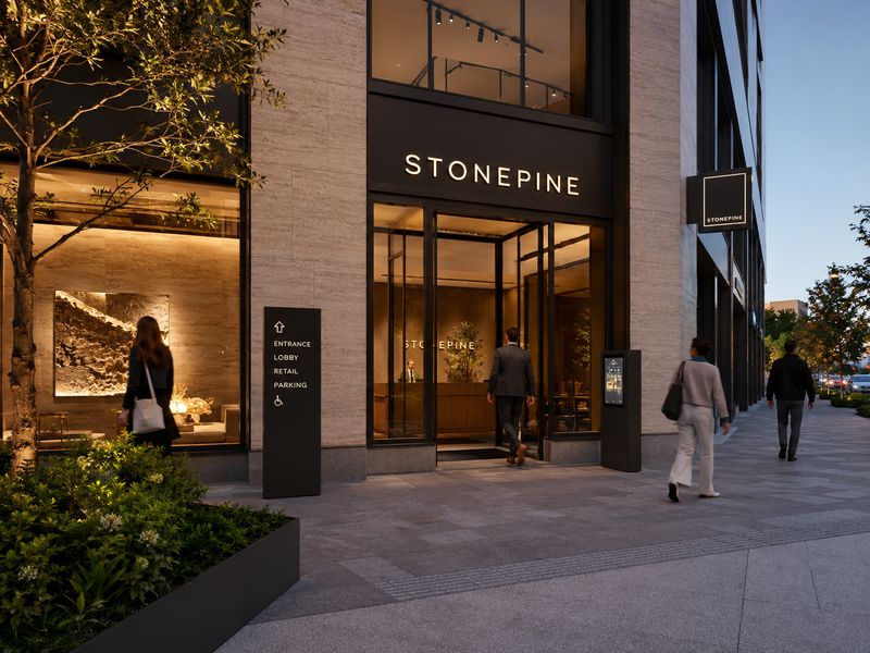 Coordinated commercial signage system with channel letters, blade sign, accessible wayfinding, and interior logo wall