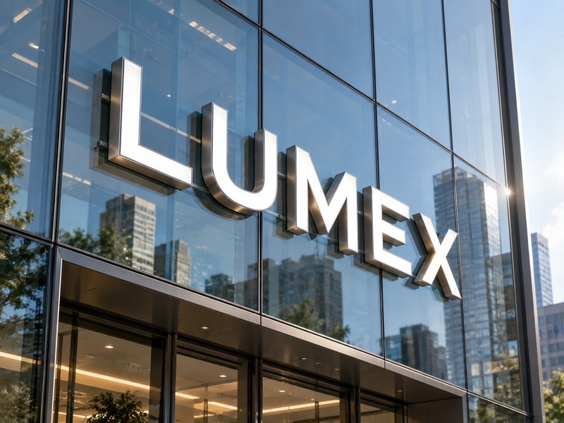 Curtain wall channel letters installed on a modern glass building facade