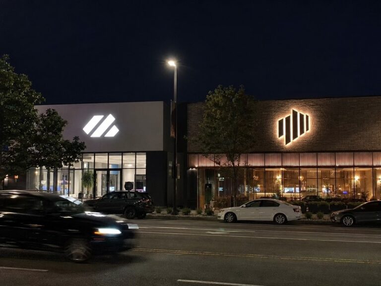 Front-lit and backlit channel letters comparison on modern commercial buildings