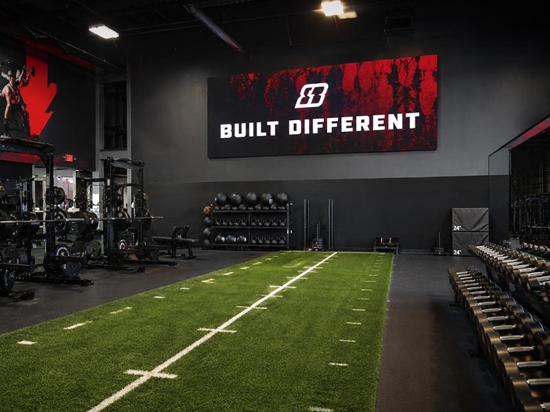Large LED sign installed in a gym training zone