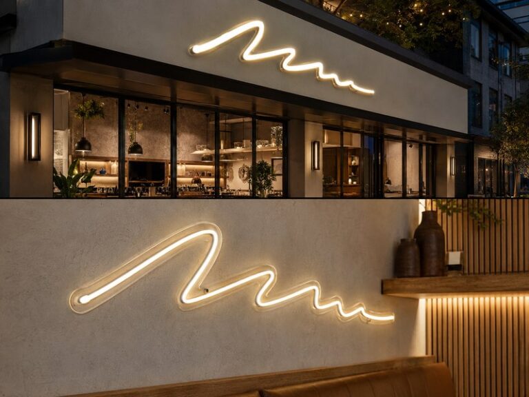 LED neon sign and front-lit channel letters compared in a modern commercial signage application