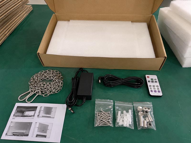 LED sign installation accessories including screws, spacers, hanging chain, adapter, dimmer, remote controller, and packing foam