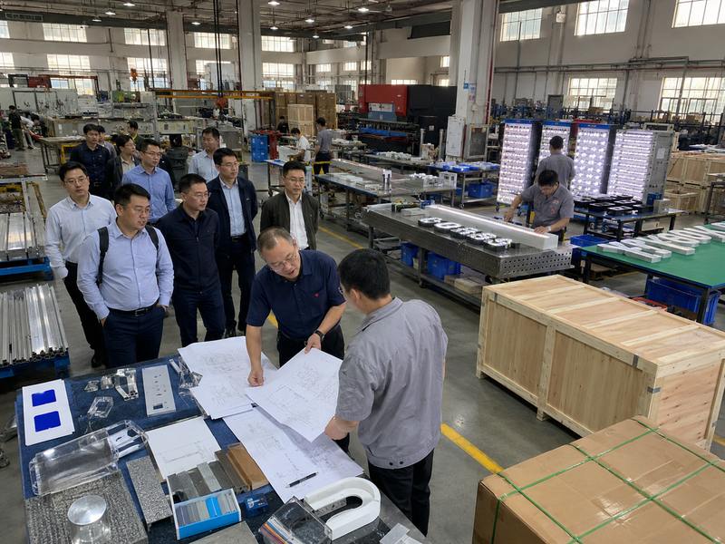 Project team evaluating an ODM sign manufacturer’s engineering, production, testing, and packaging capabilities