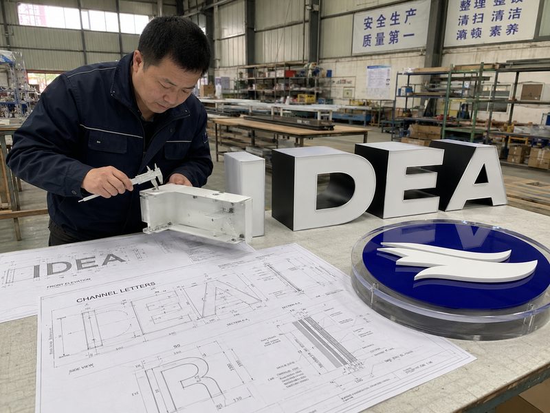 Sign broker manufacturing workflow from approved drawings to finished custom signs